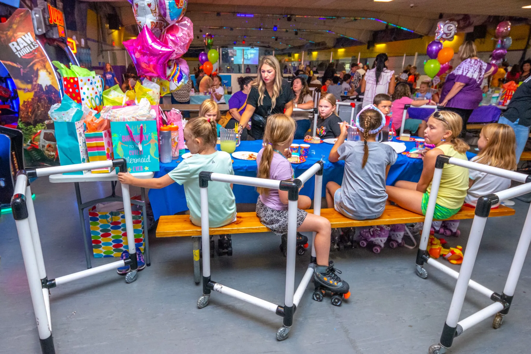 Kids celebrating with colorful balloons