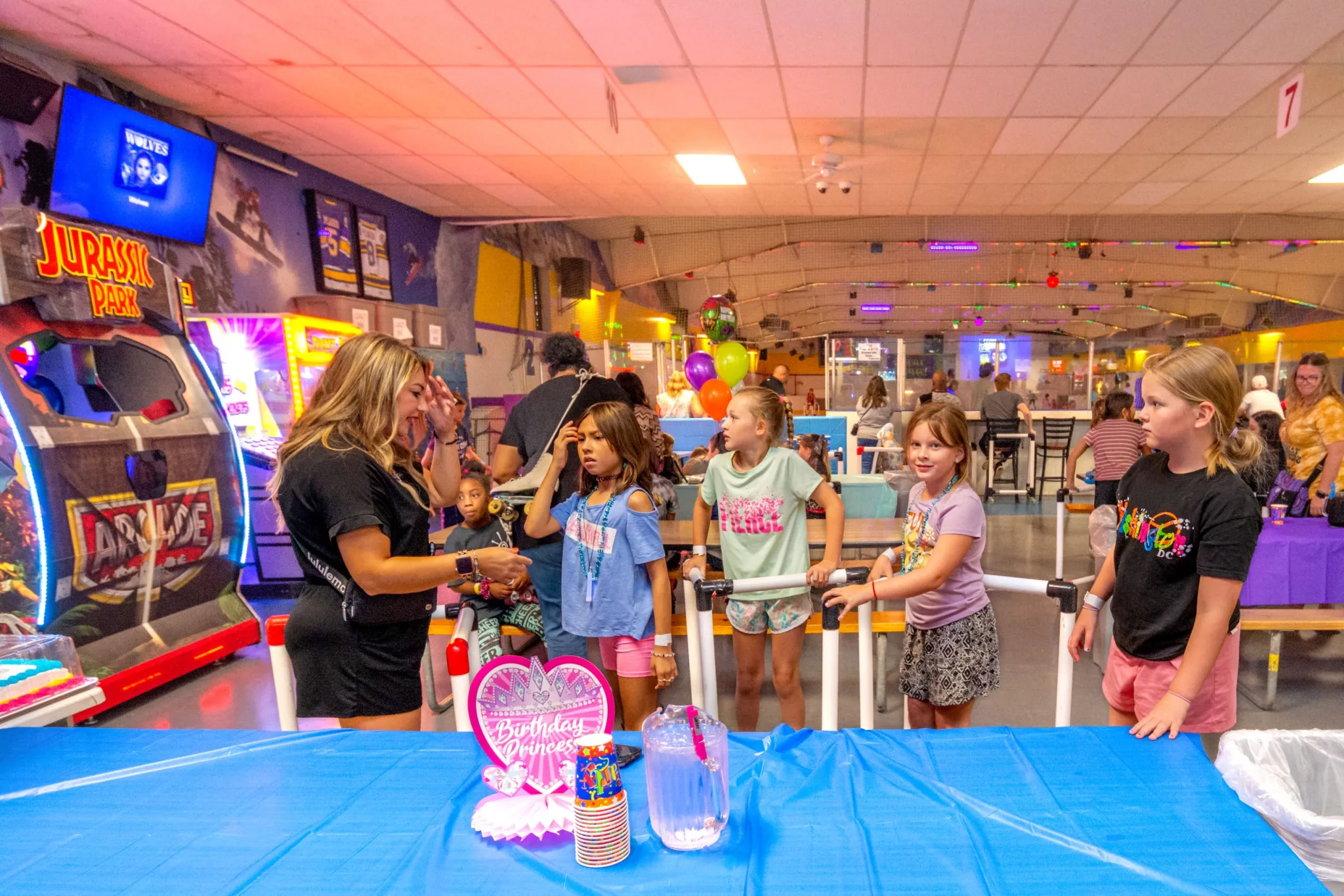 Kids gathered at arcade birthday celebration