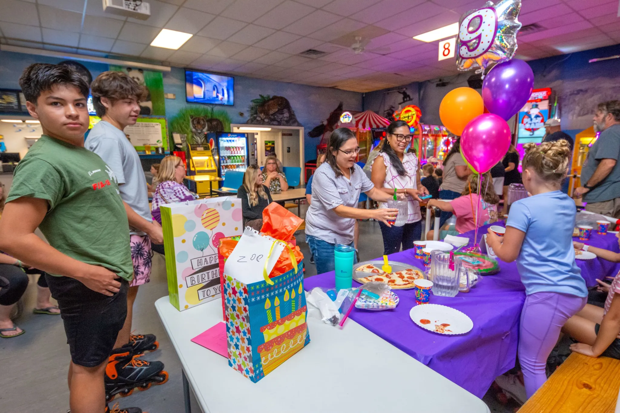 Birthday party with balloons and gifts